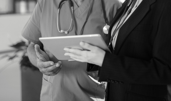 Health-Administrator-Talking-With-Nurse-Park-University (1)